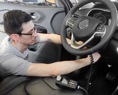 Smart Start Technician Installing an Interlock Device in car