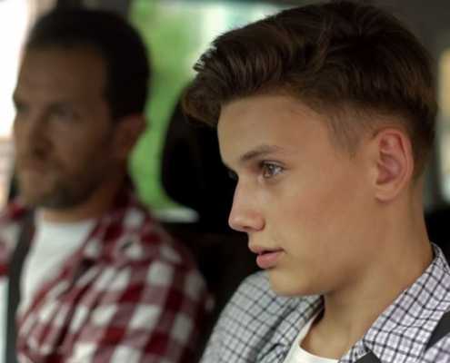 Teen driver talks with father